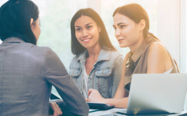 istock Multicultural businesswomen in group meeting. 967438016