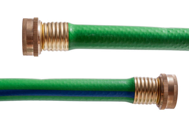 New green garden hose isolated on a white background
