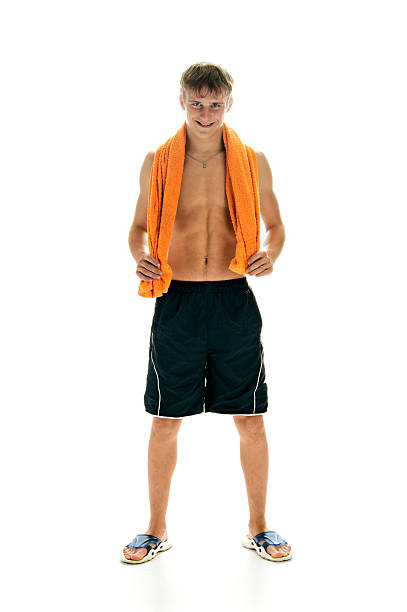 istock tanned man with towel 96749047