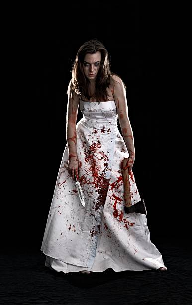 portrait of woman covered with blood stock photo