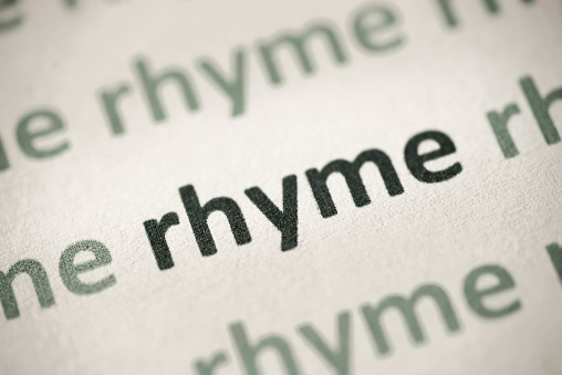 word rhyme printed on white paper macro