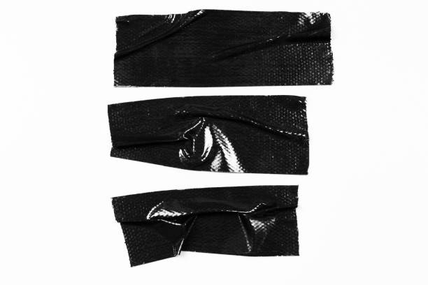 istock Set of black tapes on white background. Torn horizontal and different size black sticky tape, adhesive pieces. 967526726