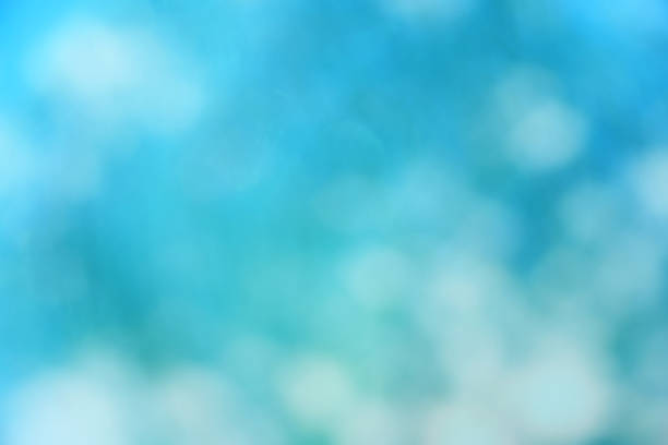 istock blue color abstract background with blurred defocus bokeh light for template 967538030