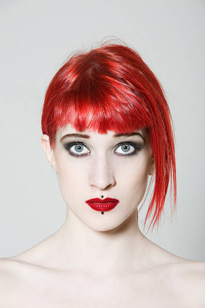 istock blank expression redhead girl woman portrait alternative lifestyle 96754113