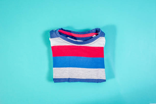 top view of a children's long-sleeved t-shirt. - stripped shirt imagens e fotografias de stock