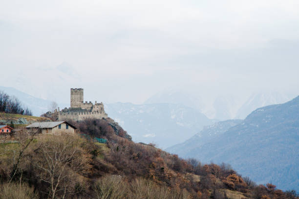 istock Cly castle in Aosta Valley and Mountain range, Saint-Denis, Valle d'Aosta, Italy 967548490