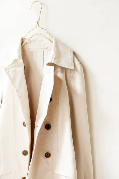 istock Beige or greige elegant trench coat isolated over white 967552968
