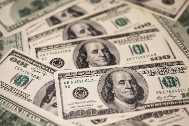 istock Background of one hundred dollar bills 967553218