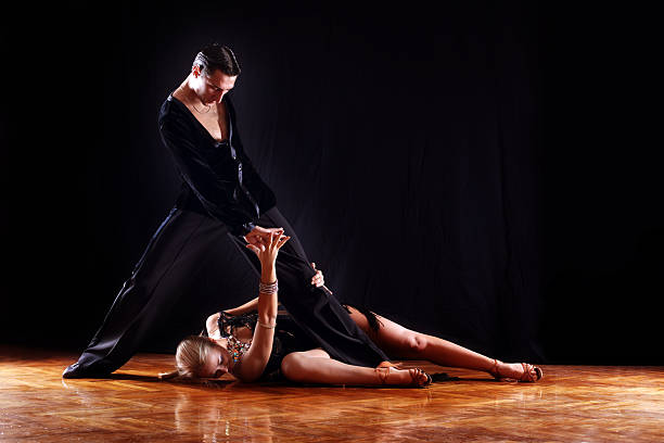 istock dancers in ballroom against black background 96756018