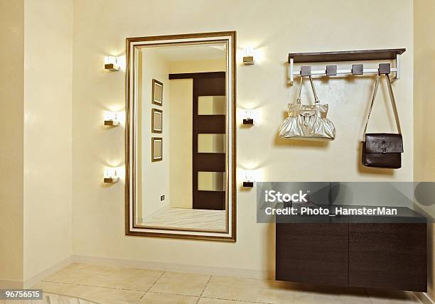 Hall In Beige Tones With Hallstand And Golden Mirror Stock Photo - Download Image Now