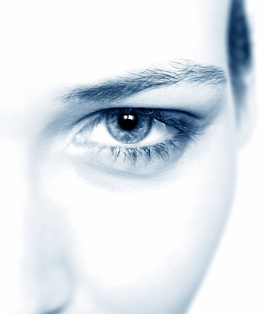 istock A close-up of half a person's face colored in blue 96759388
