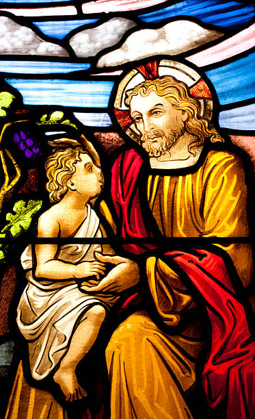istock Stained glass window with Jesus and child 96760933