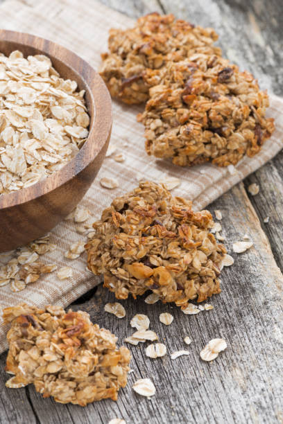 istock healthy oatmeal cookies, vertical, top view 967618212