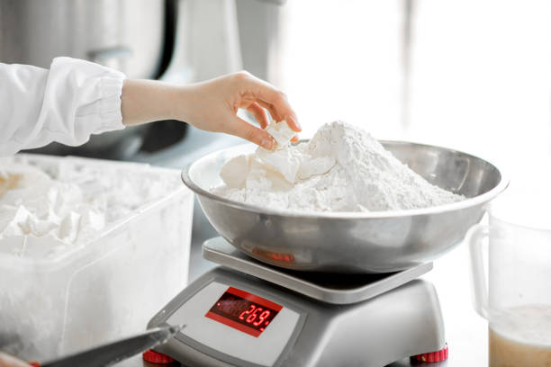 istock Weighing flour for baking at the manufacturing 967629704