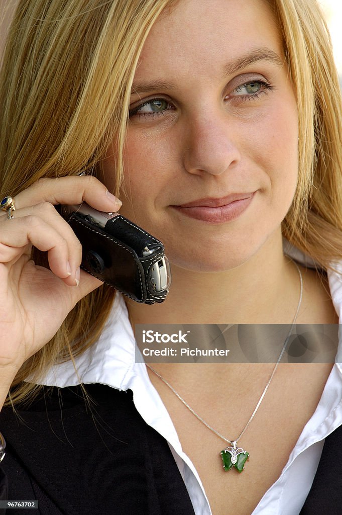 Business Woman On a Cell Phone  Corporate Business Stock Photo