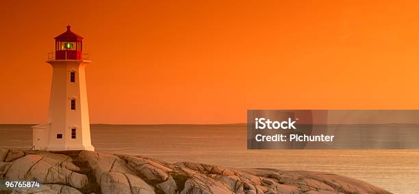 Peggys Cove Lighthouse At Sunset Stock Photo - Download Image Now - Atlantic Ocean, Canada, Lighthouse