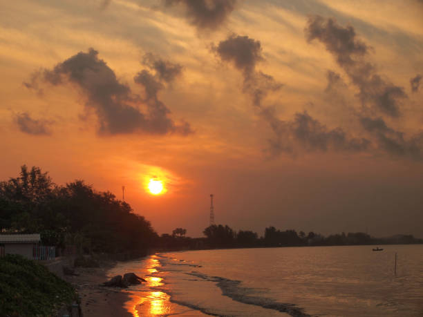 istock Sunset view over sea with stones 967661150