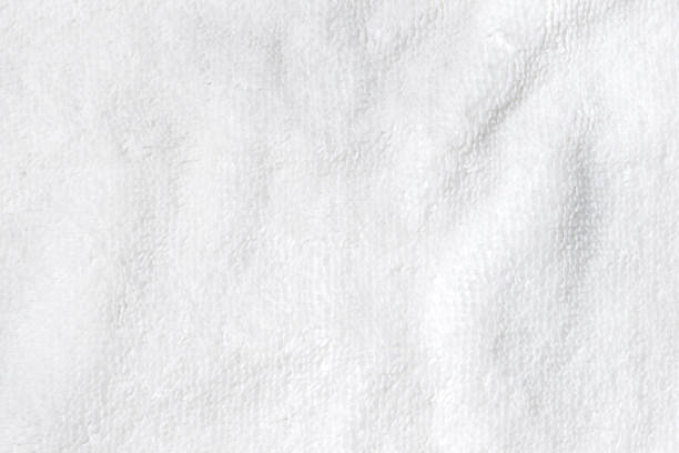 soft white texture of bath towel folded like background