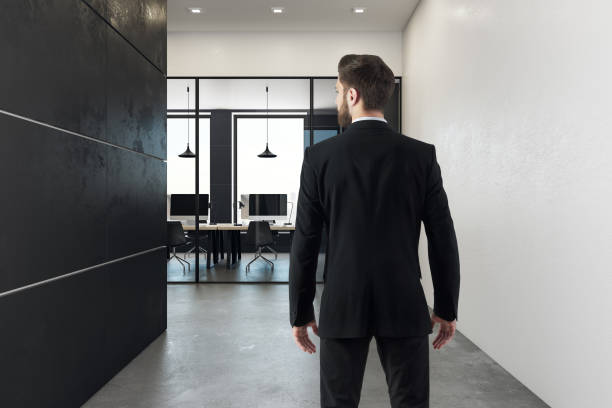 istock Businessman in coworking office interior 967665256