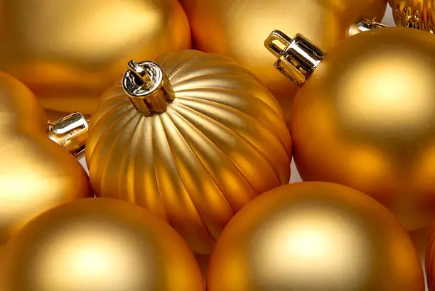 Close Up Deatail Of Gold Colored Christmas Ornaments