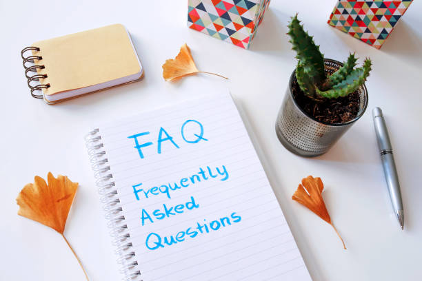 istock FAQ Frequently Asked Questions written in notebook 967668494
