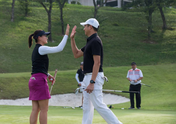istock High 5 after that great golf shot 967669810