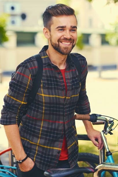 istock A man near bicycle parking. 967672204