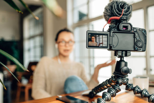 istock Woman blogger recording her content on camera 967673992