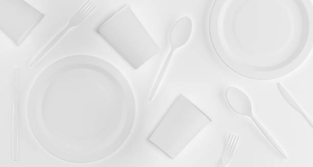 istock White Realistic Plastic Cups, Plates, Forks, Spoons And Knifes Top View 3D Rendering 967677072
