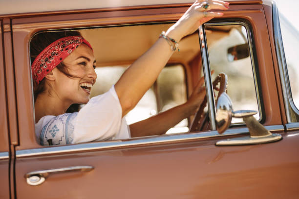 istock Woman enjoying driving car 967678182
