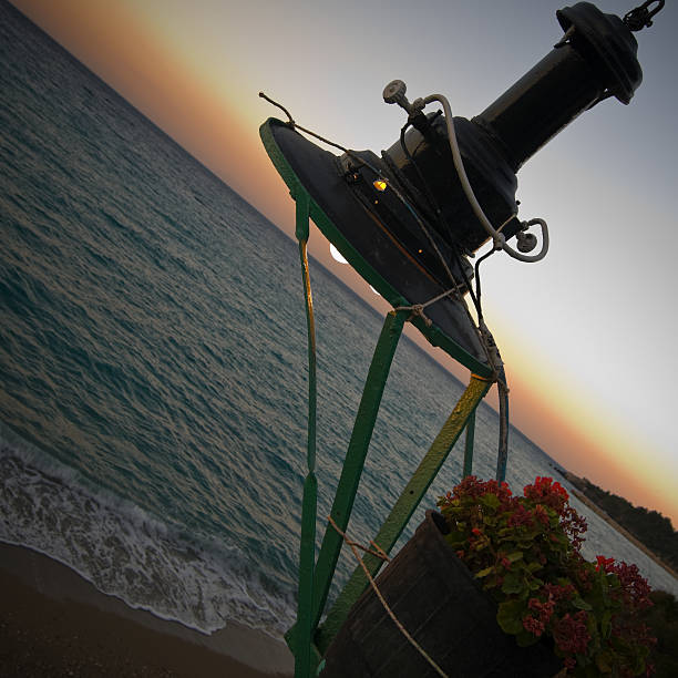 istock Sea view with lamp at the sunset 96768268