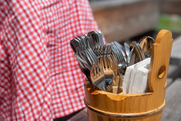 Cutlery basket in Austria on a table in the Alps