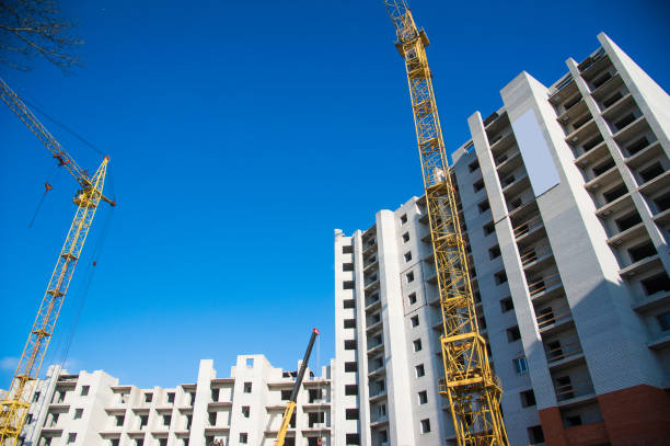 istock Construction of multi-storey residential building 967699928
