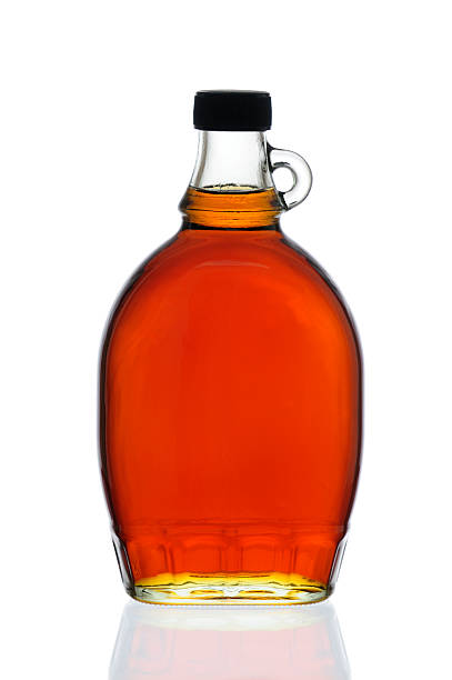 Maple Syrup Bottle  maple syrup stock pictures, royalty-free photos & images