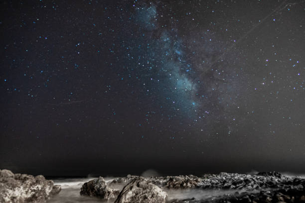 istock Beach rock with milkyway background madeira 967701686