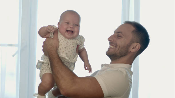 istock Happy young father playing with little daughter 967716478
