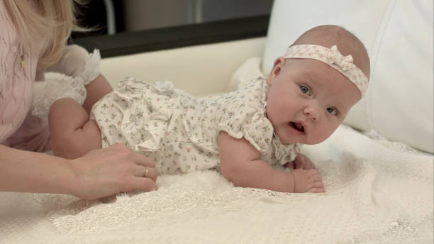 istock Cute 3 months baby lying down on a blanket 967716768