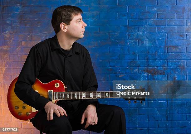 Man With Guitar On Lap Stock Photo - Download Image Now - 30-39 Years, Adult, Adults Only