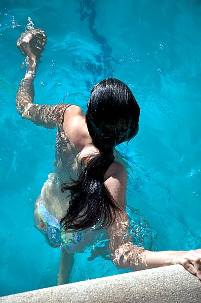 istock woman waiting to swim 96772798