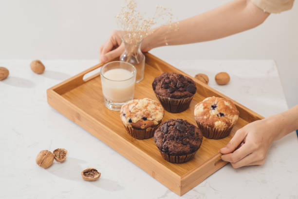 istock Breakfast with fresh homemade delicious muffins and milk. 967744480