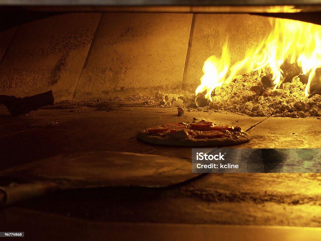 Pizza - Foto de stock de Pala de pizza libre de derechos