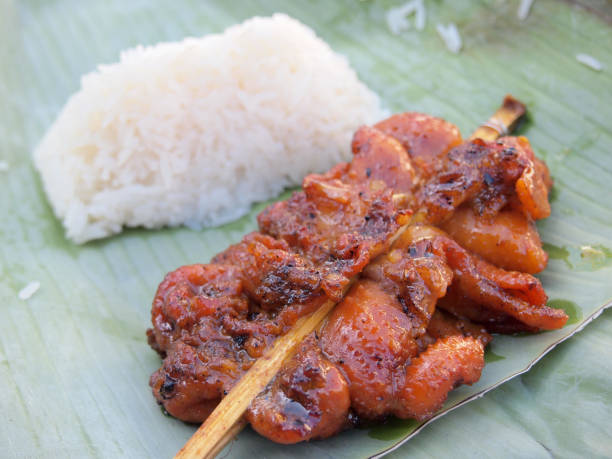istock Skewer chicken pieces and sticky rice 967759298