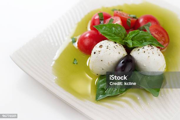 Caprese Style Salad Stock Photo - Download Image Now - Appetizer, Basil, Black Color