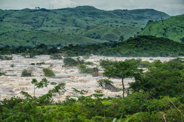 Inga Rapids of Livingstone Falls at Lower Congo River The famous Livingstone Falls at the lower Congo River - this is the last navigable point before the Livingstone rapids make the river impassable for a long stretch upriver. The falls are named for the explorer David Livingstone and are providing a difference in altitude of 270 meters over a distance of 350 km. Congo river is the deepest river of the world and the largest river in Africa. democratic republic of the congo stock pictures, royalty-free photos & images