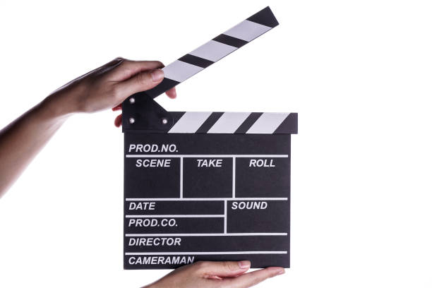 istock Hands holding clapper board or slate film concept. 967785396