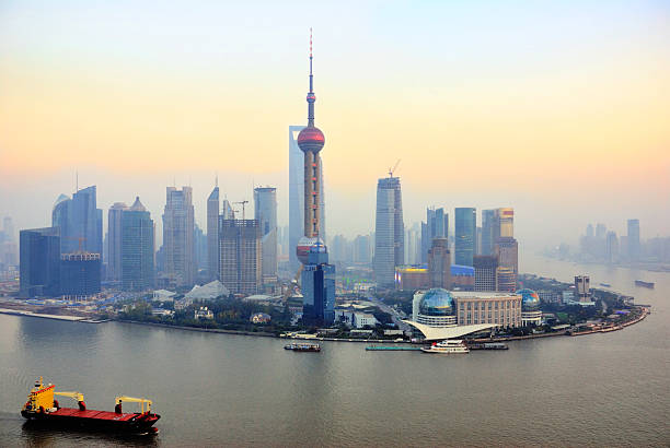 istock Shanghai Pudong skyline in front of river at sunset 96778692