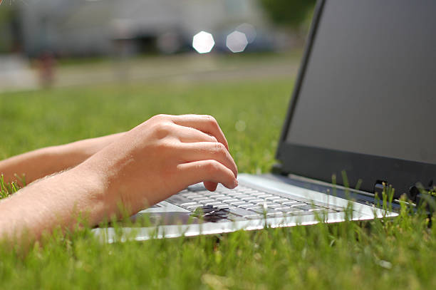 istock Laptop in the Lawn 96778811
