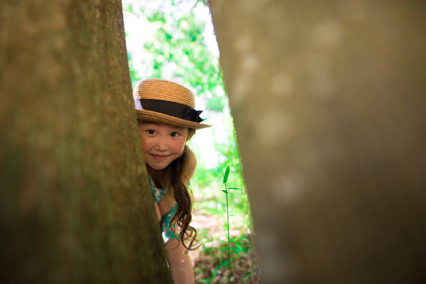 istock Girl playing in the forest 967788668