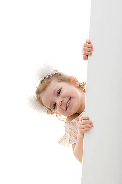 istock Little girl holding a white board 96779290