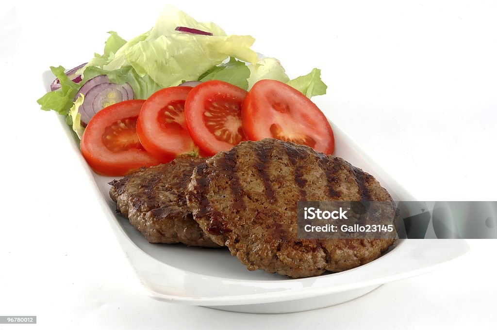 Hamburger di manzo piatto - Foto stock royalty-free di Affamato